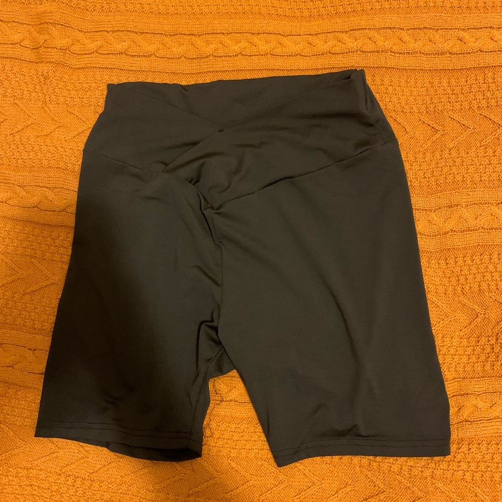 black biker shorts with a cross-cross waist